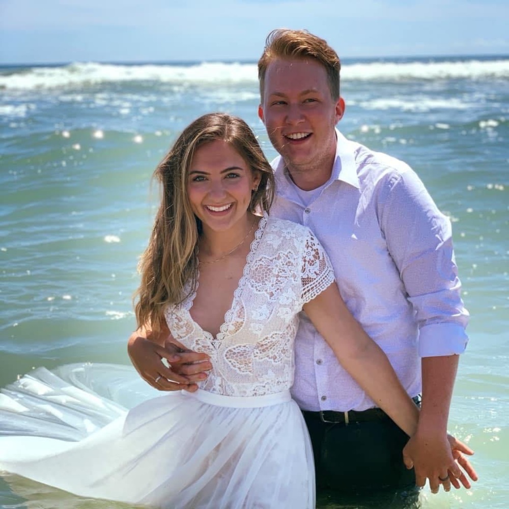 White lace romper and sheer over skirt.